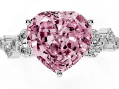Fancy Pink Heart Cut Diamond Ring Set in Platinum with Scattered Round Accents