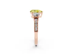 Fancy Yellow Pear Cut Diamond Three-Stone Ring Set in Rose gold with Round Side Stones and Pavé Band