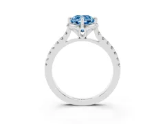 Fancy Blue Cushion Cut Diamond Solitaire Ring Set in Platinum with Pavé Band and Floral Prong Setting