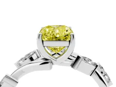 Fancy Yellow Radiant Cut Diamond Solitaire Ring Set in Platinum with Twisted Marquise Accent Band