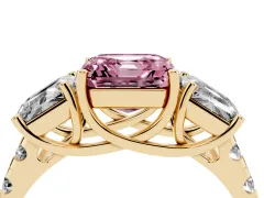 Fancy Pink Asscher Cut Diamond Three-Stone Ring Set in Yellow gold with Pavé Band