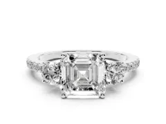Asscher Cut Diamond Three-Stone Ring Set in Platinum with Pavé Band and Graduated Sides