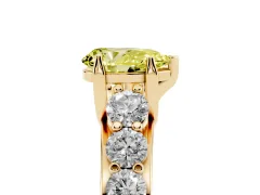 Fancy Yellow Pear Cut Diamond Pavé Engagement Ring Set in Yellow gold with Prong Setting
