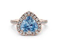 Fancy Blue Heart Cut Diamond Pavé Halo Engagement Ring Set in Rose gold with Pavé Band and Prong Setting