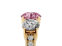 Fancy Pink Round Cut Diamond Three-Stone Engagement Ring Set in Yellow gold with Milgrain Pavé Band