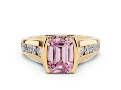 Fancy Pink Emerald Cut Diamond Bezel-Set Solitaire Ring Set in Yellow gold with Channel-Set Band