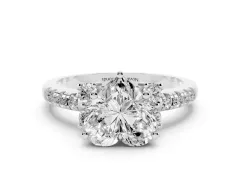 Heart Cut Diamond Three-Stone Pavé Ring Set in White gold with Prong Setting