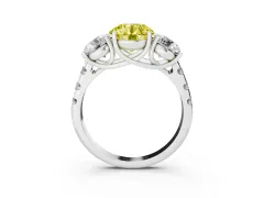 Fancy Yellow Round Cut Diamond Three-Stone Ring Set in Platinum with Pavé Band
