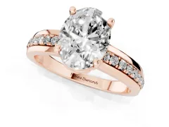 Oval Cut Diamond Solitaire Ring Set in Rose gold with Channel Set Band and Prong Setting