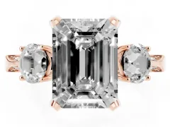 Fancy Pink Emerald Cut Diamond Three-Stone Ring Set in Rose gold with Pavé Band and Smaller Side Stones