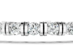 Round Brilliant Diamond Tennis Bracelet Set in White gold with Channel Set Stones and Box Clasp