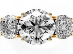 Round Cut Diamond Three-Stone Engagement Ring Set in Yellow gold with Milgrain Pavé Band
