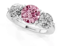 Fancy Pink Round Cut Diamond Three-Stone Ring Set in Platinum with Prong Setting and Plain Band