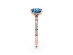 Fancy Blue Radiant Cut Diamond Solitaire Engagement Ring Set in Rose gold with Round Pavé Band and Prong Setting