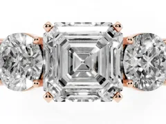 Asscher Cut Diamond Three-Stone Ring Set in Rose gold with Round Side Stones and Classic Band
