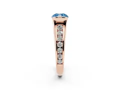 Fancy Blue Cushion Cut Diamond Bezel-Set Solitaire Ring Set in Rose gold with Channel-Set Band