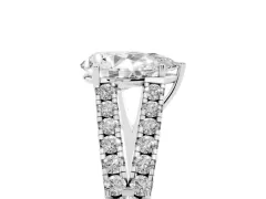 Pear Cut Diamond Split Shank Pavé Engagement Ring Set in Platinum with Prong-Held Center Stone