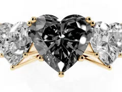 Fancy Black Heart Cut Diamond Three-Stone Ring Set in Yellow gold with Textured Band