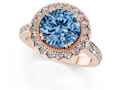 Fancy Blue Round Cut Diamond Halo Ring Set in Rose gold with Pavé Shank and Prong Setting