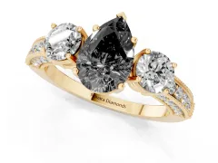 Fancy Black Pear Cut Diamond Three-Stone Ring Set in Yellow gold with Round Side Stones and Pavé Band