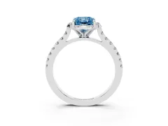 Fancy Blue Radiant Cut Diamond Solitaire Ring Set in White gold with Pavé Band and Floral Prong Setting
