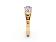 Fancy Pink Princess Cut Diamond Three-Stone Ring Set in Yellow gold with Textured Band