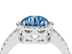Fancy Blue Round Cut Diamond Halo Ring Set in Platinum with Pavé Shoulders and Halo-Framed Center
