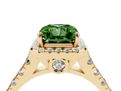 Fancy Green Radiant Cut Diamond Halo Engagement Ring Set in Yellow gold with Pavé Band and Prong-Set Center