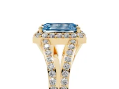 Fancy Blue Emerald Cut Diamond Halo Split Shank Pavé Ring Set in Yellow gold with Prong Setting