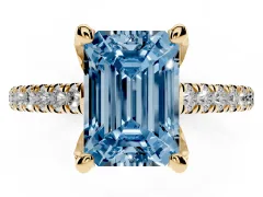 Fancy Blue Emerald Cut Diamond Solitaire Ring Set in Yellow gold with Brilliant Pavé Band and Prong Setting