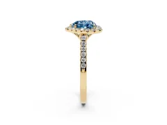 Fancy Blue Heart Cut Diamond Pavé Halo Engagement Ring Set in Yellow gold with Pavé Band and Prong Setting