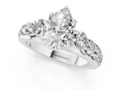 Pear Cut Diamond Pavé Engagement Ring Set in Platinum with Prong Setting