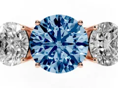 Fancy Blue Round Cut Diamond Three-Stone Ring Set in Rose gold with Textured Band