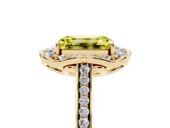 Fancy Yellow Emerald Cut Diamond Halo Ring Set in Yellow gold with Pavé-Lined Shoulders and Prong Setting