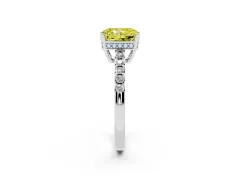 Fancy Yellow Radiant Cut Diamond Solitaire Engagement Ring Set in Platinum with Pavé Band and Prong Setting