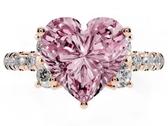Fancy Pink Heart Cut Diamond Three-Stone Pavé Ring Set in Rose gold with Prong Setting
