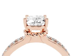 Oval Cut Diamond Solitaire Ring Set in Rose gold with Channel Set Band and Prong Setting