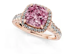 Fancy Pink Cushion Cut Diamond Halo Engagement Ring Set in Rose gold with Pavé Band and Prong-Set Center