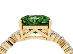Fancy Green Radiant Cut Diamond Ring Set in Yellow gold with Scattered Round Accents