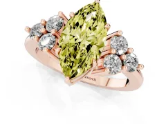 Fancy Yellow Marquise Cut Diamond Solitaire Ring Set in Rose gold with Cluster Accents on Each Side