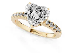 Heart Cut Diamond Solitaire Engagement Ring Set in Yellow gold with Pavé Band and Prong Setting
