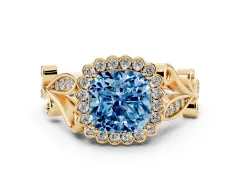 Fancy Blue Cushion Cut Diamond Halo Ring Set in Yellow gold with Leaf Motif Split Shank and Prong Setting