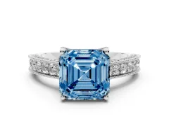 Fancy Blue Asscher Cut Diamond Solitaire Ring Set in White gold with Milgrain-Edged Pavé Band and Prong Setting