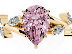Fancy Pink Pear Cut Diamond Solitaire Ring Set in Yellow gold with Twisted Marquise Accent Band