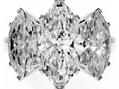 Marquise Cut Diamond Three-Stone Ring Set in White gold with Channel-Set Band and Prong Settings