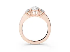 Pear Cut Diamond Three-Stone Ring Set in Rose gold with Bold Center and Classic Band