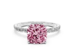 Fancy Pink Cushion Cut Diamond Solitaire Engagement Ring Set in White gold with Round Pavé Band and Prong Setting