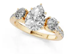 Pear Cut Diamond Three-Stone Ring Set in Yellow gold with Round Side Stones and Delicate Pavé Band
