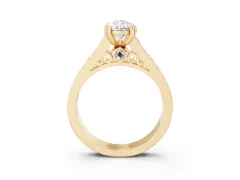 Pear Cut Diamond Channel Set Solitaire Engagement Ring Set in Yellow gold with Prong Setting