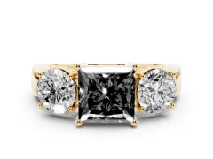 Fancy Black Princess Cut Diamond Three-Stone Ring Set in Yellow gold with Round Side Stones and Classic Band